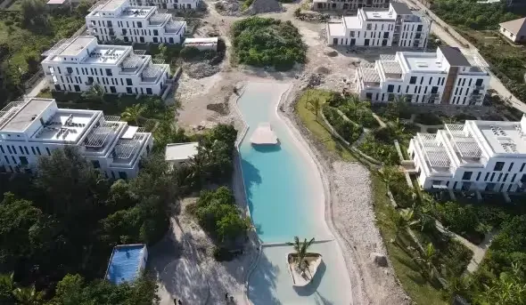 Commercial water park and swimming pool construction project with custom water slides designed by Swimwell