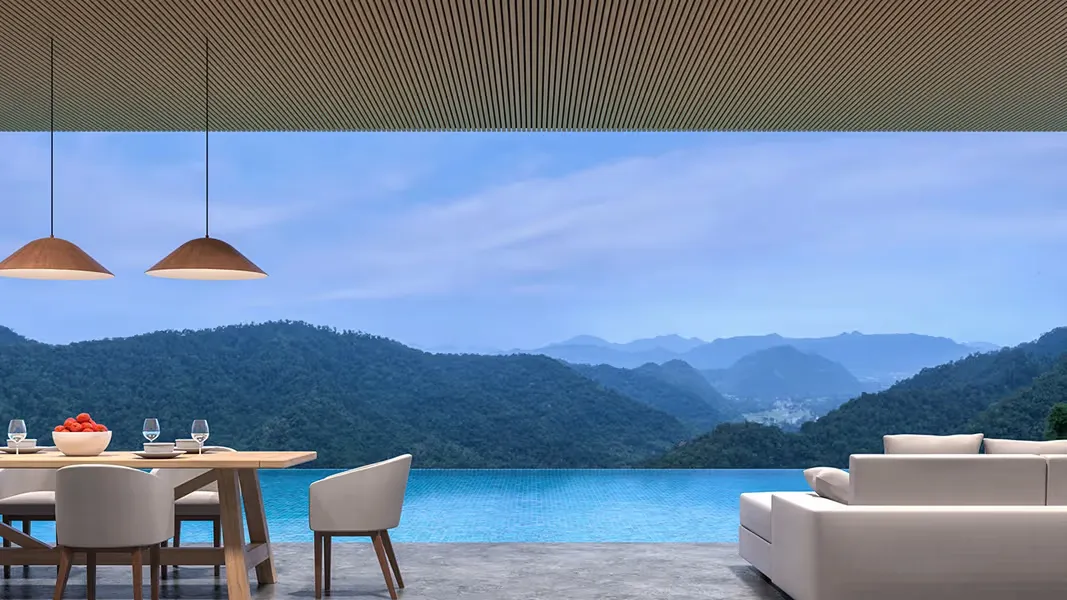 Infinity Swimming Pool design with seamless vanishing edge overlooking scenic landscape view